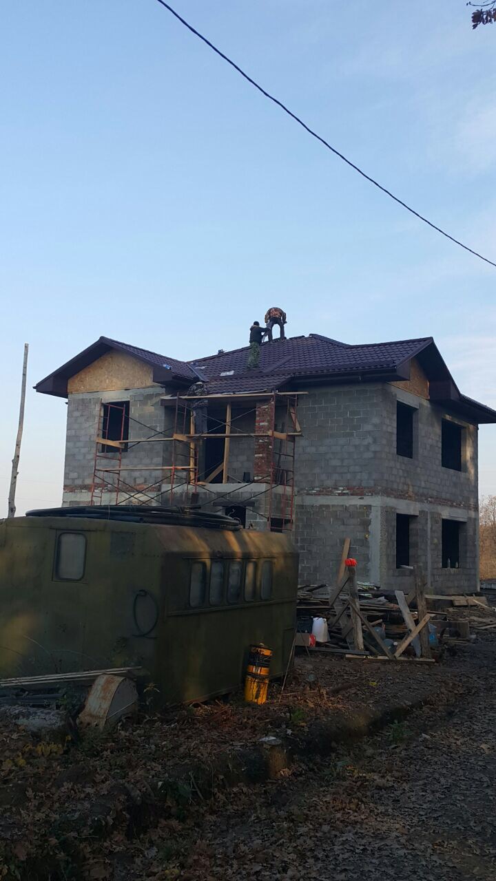 Дом из керамзитоблоков с облицовкой штукатуркой