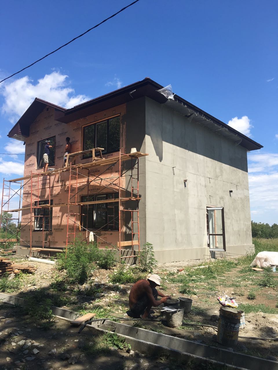 Дом из керамзитоблоков с облицовкой штукатуркой