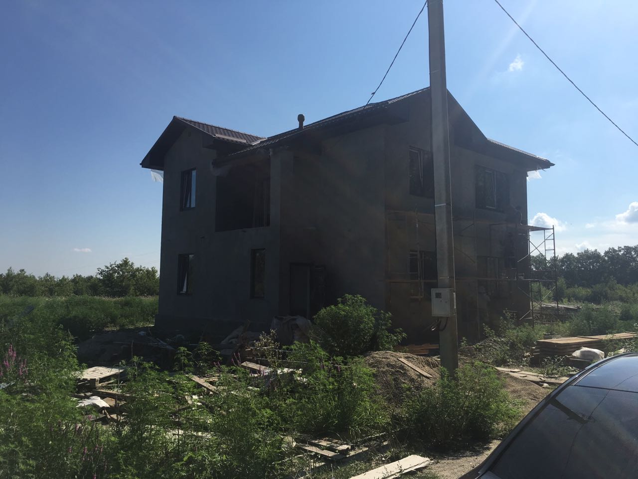 Дом из керамзитоблоков с облицовкой штукатуркой